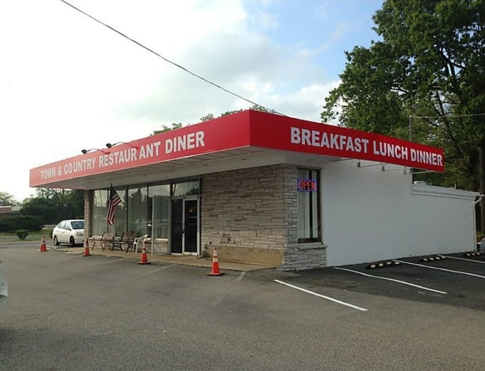 Town & Country Restaurant Diner on Route 37, its red sign reading Breakfast Lunch Dinner