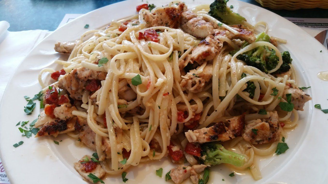 Linguine with grilled chicken, broccoli and roasted peppers